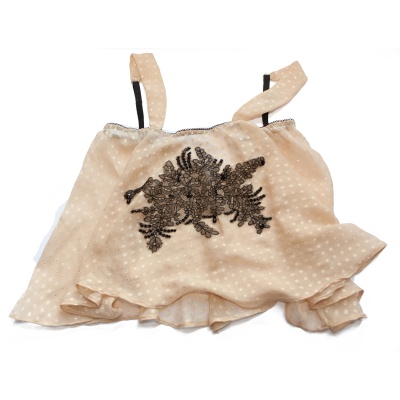 A one off silk camisole embellished with hand-stitched Victorian lace. Design by Karolina Laskowska